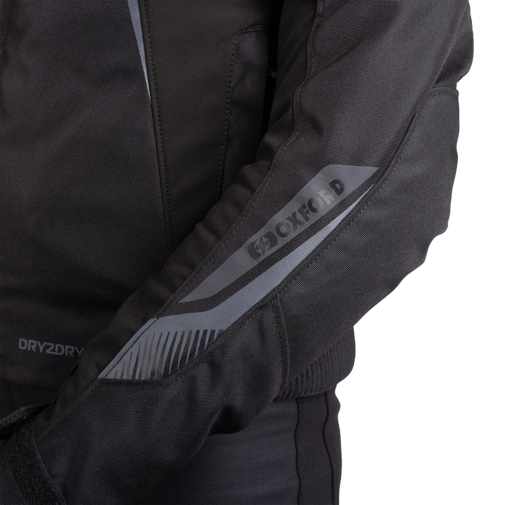 Oxford Omega 1.0 Dry2Dry Women’s Jacket in Stealth Black or Black/Camo/Red - TW24310...